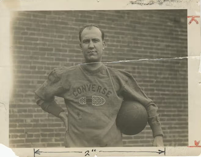 photo of Chuck Taylor in basketball uniform