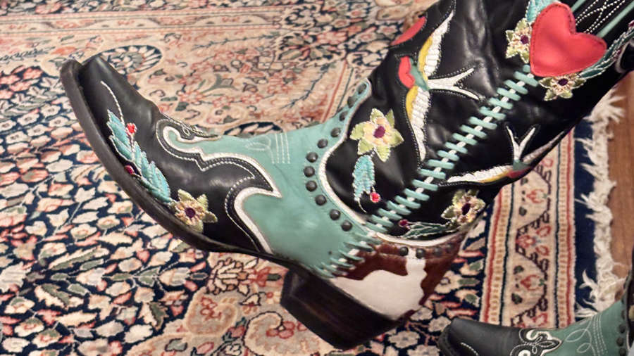 a cowboy boot worn as fashion